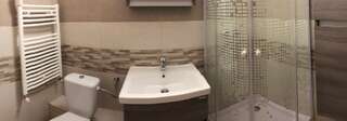 Хостелы Mil Pasos Penthouse Hostel Бухарест Односпальная кровать в общем номере для мужчин и женщин-9