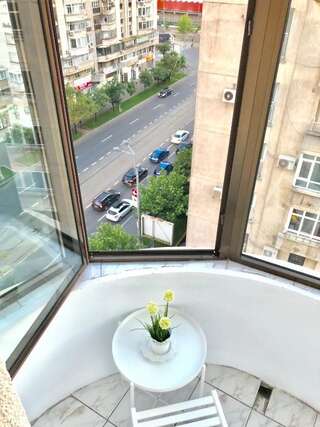 Хостелы Mil Pasos Penthouse Hostel Бухарест Односпальная кровать в общем номере для мужчин и женщин-12